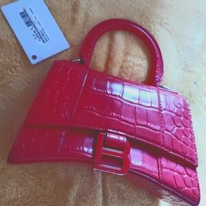 Balenciaga hour glass hand bag.